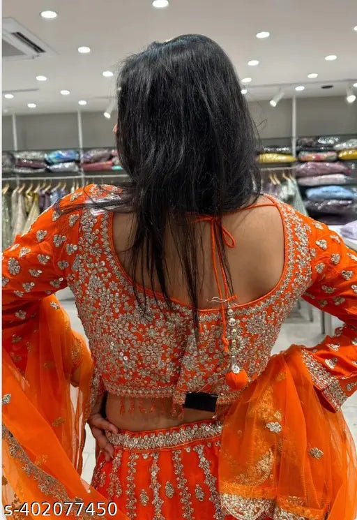 Orange Georgette lehenga-choli set, intricately embroidered, festive wear for wedding
