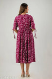Printed rayon long anarkali kurta with 3/4 sleeves, tassels, and hand embroidery. Women's ethnic wear in cotton fabric, color retains after wash
