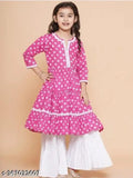 Fancy printed rayon anarkali kurta & sharara set with lace work for girls aged 4-5 years, above knee length, pink patterned top on display
