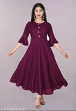 Purple rayon flared kurti with embroidered pattern, suitable for casual and formal occasions. Size range from XS to XXXL. Hand wash or machine wash recommended. Made in India