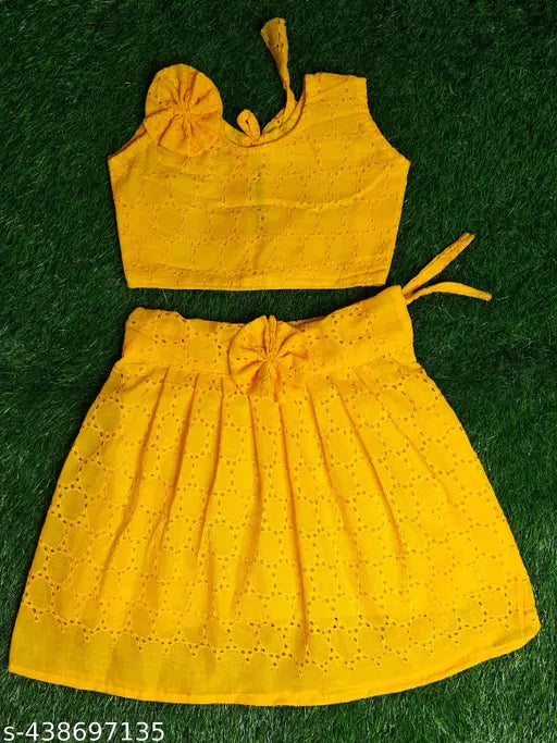 Embroidered cotton dupatta and sleeveless lehenga set, Indian traditional babywear with net stitching on display