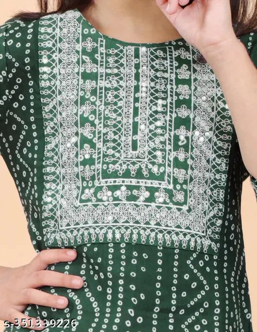 Girls printed rayon kurti and sharara set, three-quarter sleeves, A-line style, available in multiple sizes for ages 5-12. Indian ethnic fashion on display