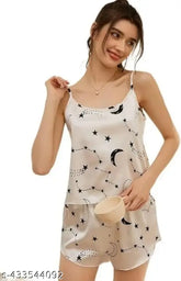 Cotton blend baby doll nightsuit with printed top & shorts, trendy round neck and short sleeves. India origin