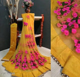 Mustard net saree with floral embroidery and pearl borders - elegant Indian attire for special occasions