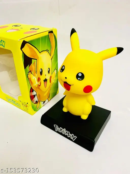 Yellow Pikachu car dashboard art, cute figurine from India