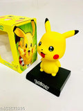 Yellow Pikachu car dashboard art, cute figurine from India