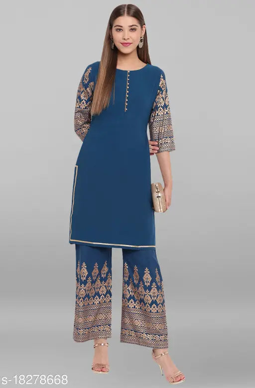 Women's poly crepe printed long kurti with palazzos in multiple sizes - vibrant Indian fashion attire on model