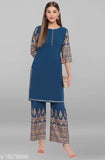 Women's poly crepe printed long kurti with palazzos in multiple sizes - vibrant Indian fashion attire on model