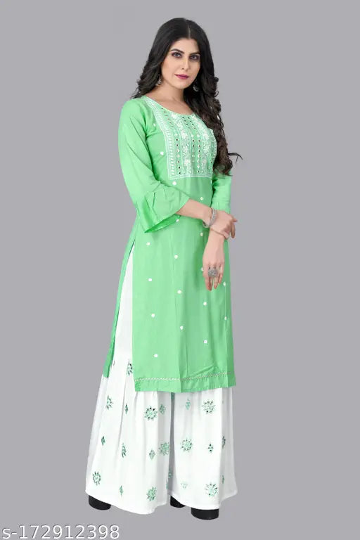 Pista color embroidery kurti and sharara set for women & girls, rayon fabric with three-quarter sleeves. Indian hand-embroidered traditional outfit for festivals or everyday wear
