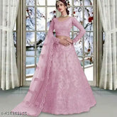 Embroidered net semi-stitched lehenga choli and dupatta, traditional Indian attire with intricate patterns