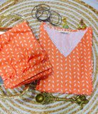 Orange and white floral print Rayon kurti pant set with palazzos, intricate cotton lace detailing