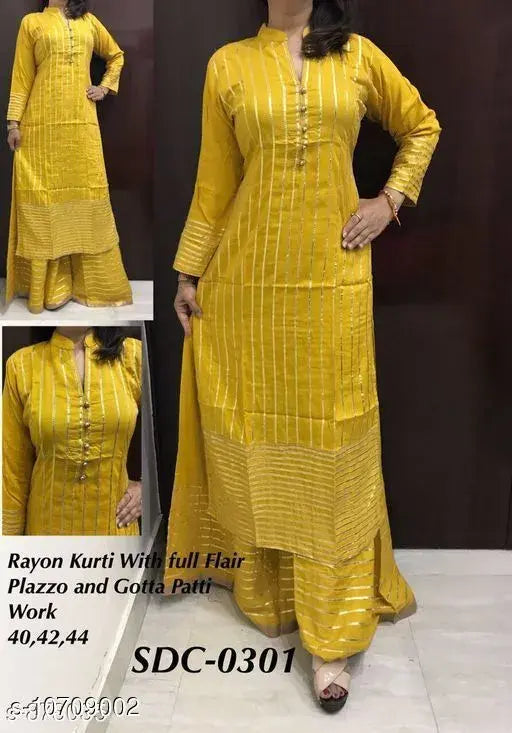 Women's solid yellow rayon kurta set with sharara palazzos, striped net three-quarter sleeves, size XS-XXXL, made in India