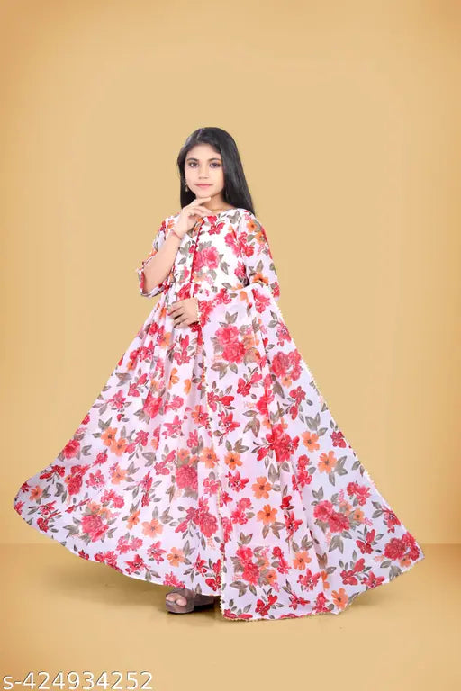 Pink rayon Georgette Anarkali gown with three-quarter sleeves, printed net pattern, featuring traditional Indian design and modern style for young women