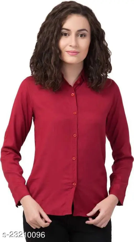 Rayon long-sleeve women's shirt, solid pattern, available in S, M, L, XL for parties or casual wear. Comfortable and stylish design from India