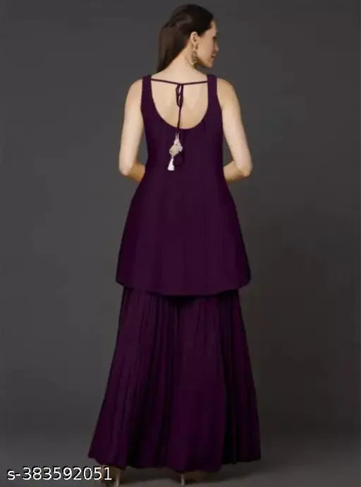 Heavy embroidery Georgette kurta sharara set with dupatta, featuring intricate designs and three-quarter sleeves. Available in various sizes: S, M, L, XL, XXL. Indian traditional clothing for women's festive wear or weddings