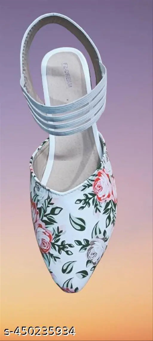 Colorful fabric with white roses and leaves, flat shoes or flats