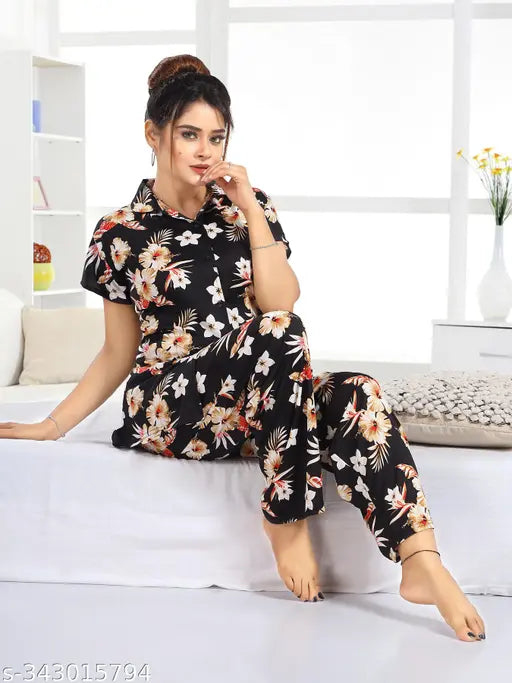 Women's printed satin nightsuite set, coordinating pyjamas for ladies and girls. Satin sleepwear with short sleeves and a printed pattern. Set includes 2 pieces in sizes M, L, XL, XXL. Made in India