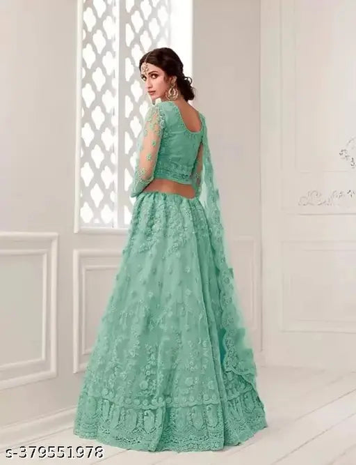 Fashionable free-size net lehenga with embroidered top and dupatta from India