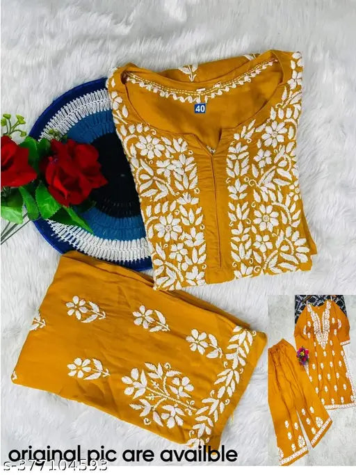 Slub rayon solid chikankari fancy suit with straight kurta and skirt, three-quarter sleeves, cotton fabric, printed net design, India origin