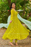 Green georgette embroidered work gown with dupatta on mannequin, three-quarter sleeves, embellished net pattern, India origin