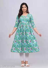 Trendy 100 cotton printed Naira cut kurti for women & girls in various sizes, straight design with three-quarter sleeves, vibrant Sanganeri and Jaipuri print. Indian ethnic wear