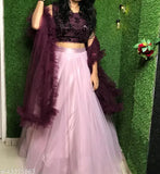 Pink jute-silk ruffle net lehenga choli for women, featuring a long flair cacan design. Semi-stitched, includes dupatta
