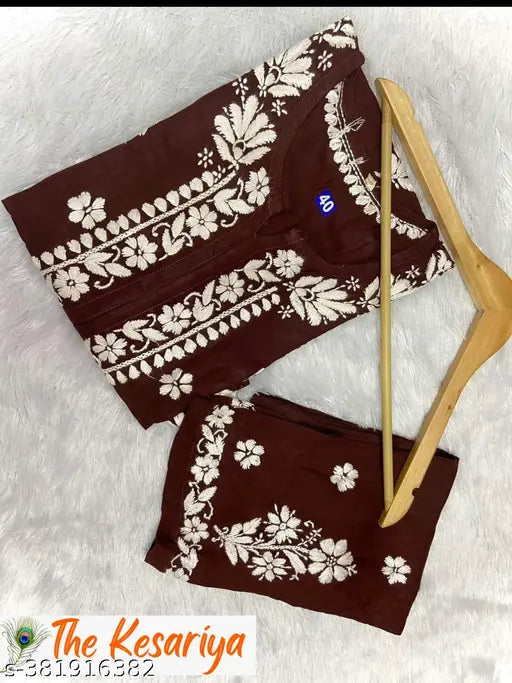 Rayon Chikankari Work Only Kurti and Plazoo set, embroidered net embellishments on three-quarter sleeve rayon kurti with matching palazzos. Single size available in various measurements. 14 kg set from India