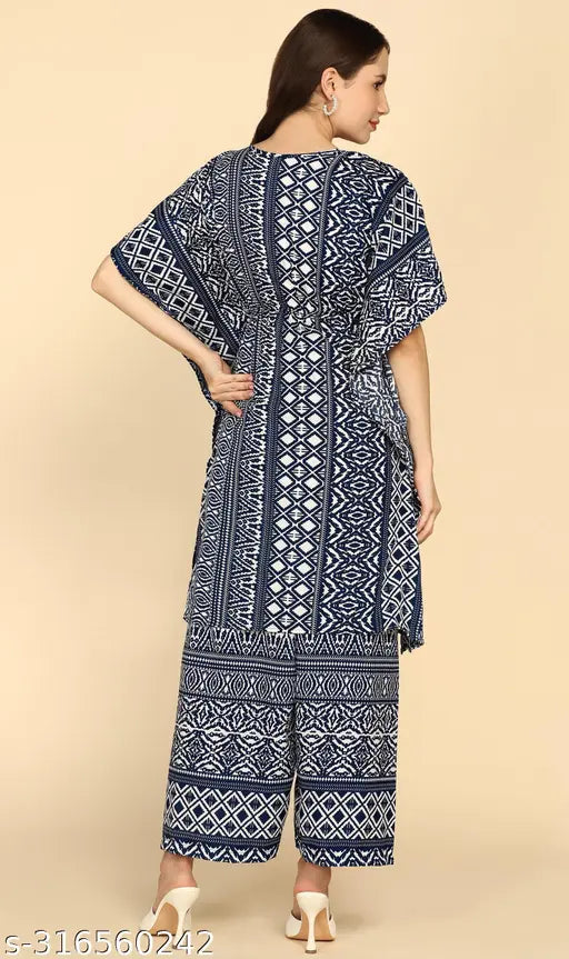 Printed rayon kaftan & palazzo set with puffed sleeves, intricate lace detailing, and ethnic embellishments. Indian-inspired women's wedding outfit with matching earrings and juttis