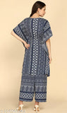 Printed rayon kaftan & palazzo set with puffed sleeves, intricate lace detailing, and ethnic embellishments. Indian-inspired women's wedding outfit with matching earrings and juttis