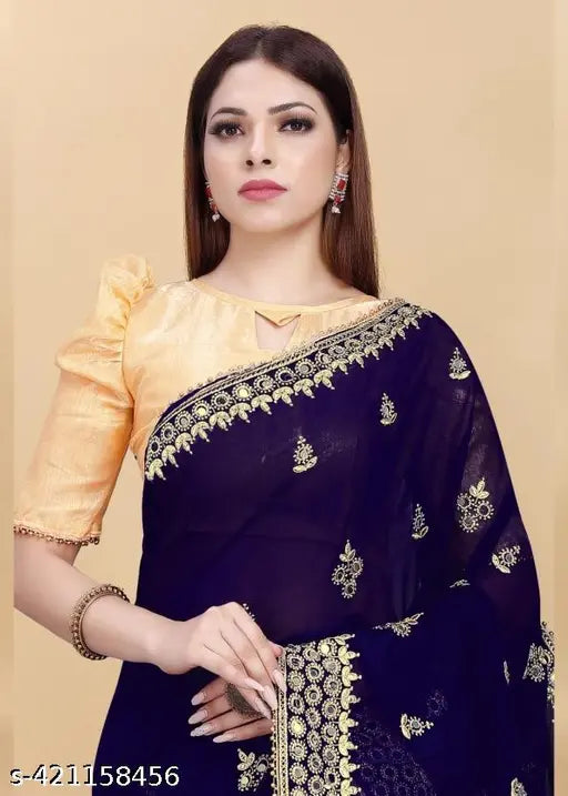 Heavy design round mirror work Georgette saree, embroidered with intricate mirrors on a free size silhouette, accentuated by a separate dupion silk blouse