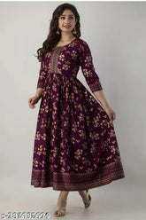 Rayon anarkali dress with wine print, three-quarter sleeves, Indian women's fashion accessory on mannequin