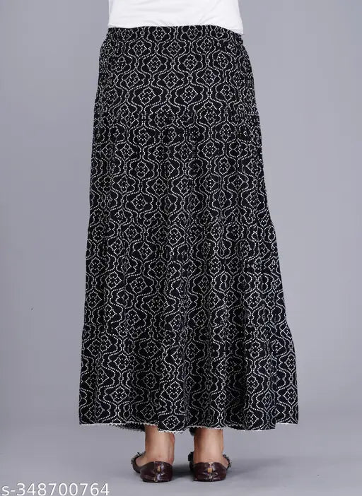 Black printed rayon long skirt for women, featuring a vibrant pattern and various sizes available (34-Free size)