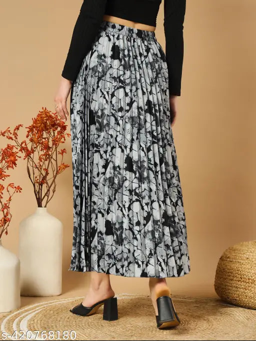 Premium lightweight printed A-line long skirt in crepe fabric, perfect for warmer seasons. Flattering fit and easy elegance, available in sizes 26-38 (waist 26-38 in, length 38 in, hip 26-38 in), made in India