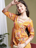 Floral printed polycotton kurta with sharara set in mustard color, anarkali style with 3/4 sleeves and lace border. Traditional yet contemporary ethnic wear for girls aged 8-15 years