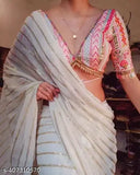 Heavy party wear Georgette saree with embroidered satin silk blouse, intricate sequin and net embroidery detail, Indian festive outfit on display