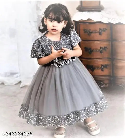 Embellished net and velvet work, short sleeves fashion wear for kids aged 2-9 years. Indian origin
