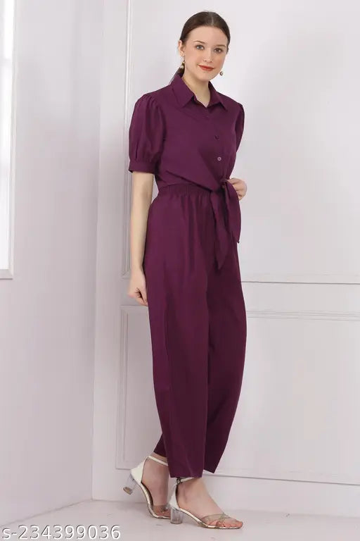 Women's solid 2-piece poly crepe jumpsuits with stylish shrug, perfect for parties, weddings, or business events. India-made quality clothing for various occasions