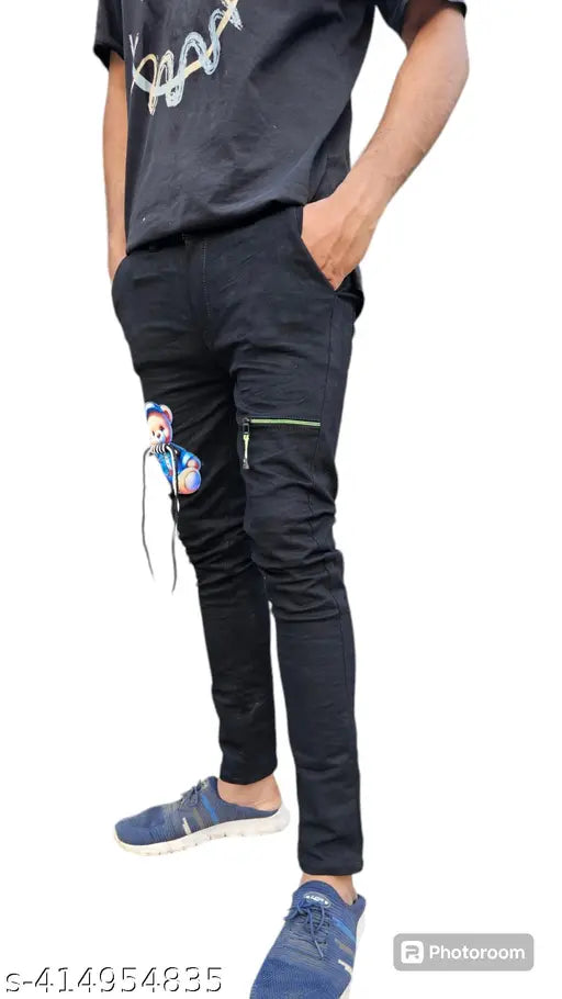 Black dyed/washed denim doll jeans on hanger, size 26-30