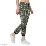 Green cotton-blend textured straight-fit trousers for women, net pattern detail on display