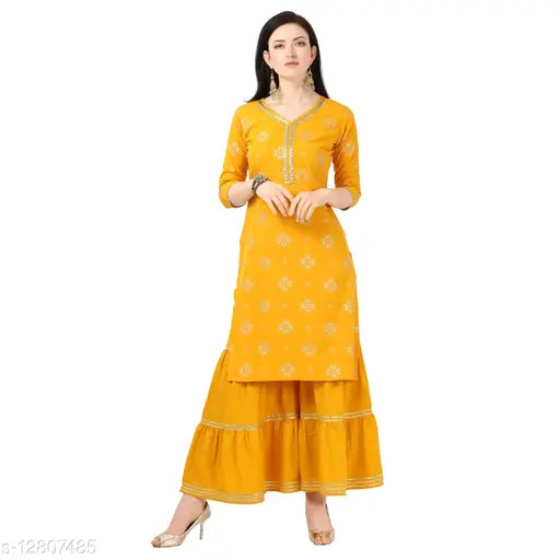 Yellow Crepe A-line Palazzo Kurta Set with Sharara bottom, printed net pattern on loose-fitting design for women's comfortable lounge wear from NAINVISH, India