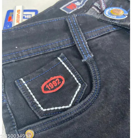 Black stretchable denim jeans, stylish slim fit mid-rise for men's comfort