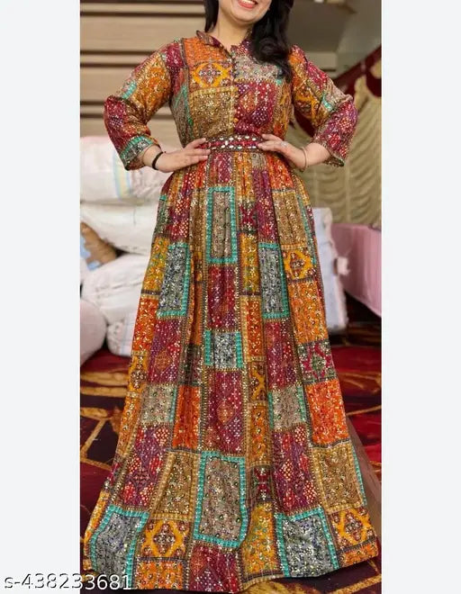 Exquisite orange rayon Anarkali gown for weddings & parties, heavily printed and fully flared, length up to 56 inches