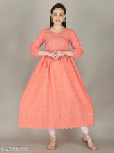 Cotton Chikankari long kurti, three-quarter sleeves for women. Traditional Indian attire showcasing intricate Chikan embroidery