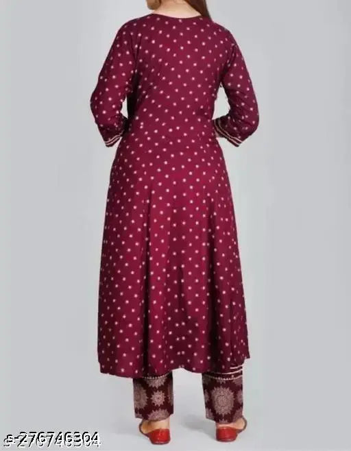 Navy-blue rayon Anarkali Dupatta Set, featuring printed Anarkali kurti and pant dupatta, three-quarter sleeves. Woman's summer fashion 2023 outfit
