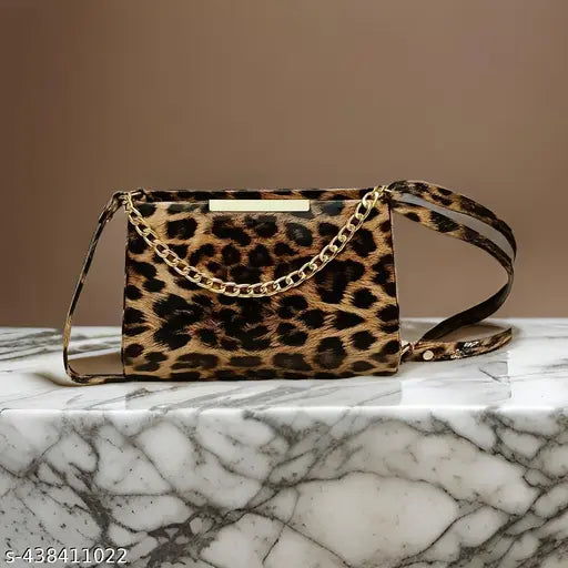 Animal print PU sling bag for women and girls. Lightweight, spacious, secure zipper closure, perfect for daily essentials. Made in India