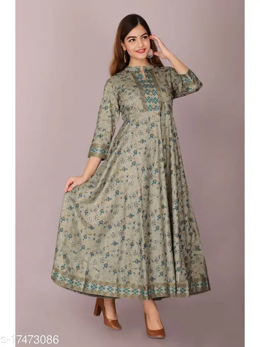 Women's printed Rayon flared Kurta with three-quarter sleeves, featuring vibrant Indian motifs. Available in various sizes from S to XXXL