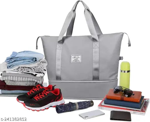 Grey foldable hand bag for traveling, lightweight waterproof duffel bag with large capacity and durable material. Perfect for yoga, gym, or short trips