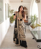 Stylish georgette kurta set in sleeveless design, embroidered with silk bottomwear. Indian ethnic wear on mannequin