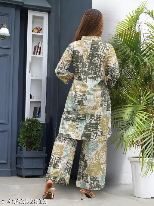 Indian printed cord set for women, featuring a round neck top and bottom sets made from polycotton fabric. Short sleeves and vibrant prints. Available in sizes S, M, and XXL. Part of the One Amore western wear collection. Made in India