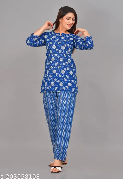 Blue night suit, printed cotton pyjamas with three-quarter sleeves, available in M (38in top bust, 28in top length, 30in bottom waist, 40in bottom hip, 38in bottom length) and XXL (44in top bust, 31in top length, 36in bottom waist, 46in bottom hip, 41in bottom length), from India